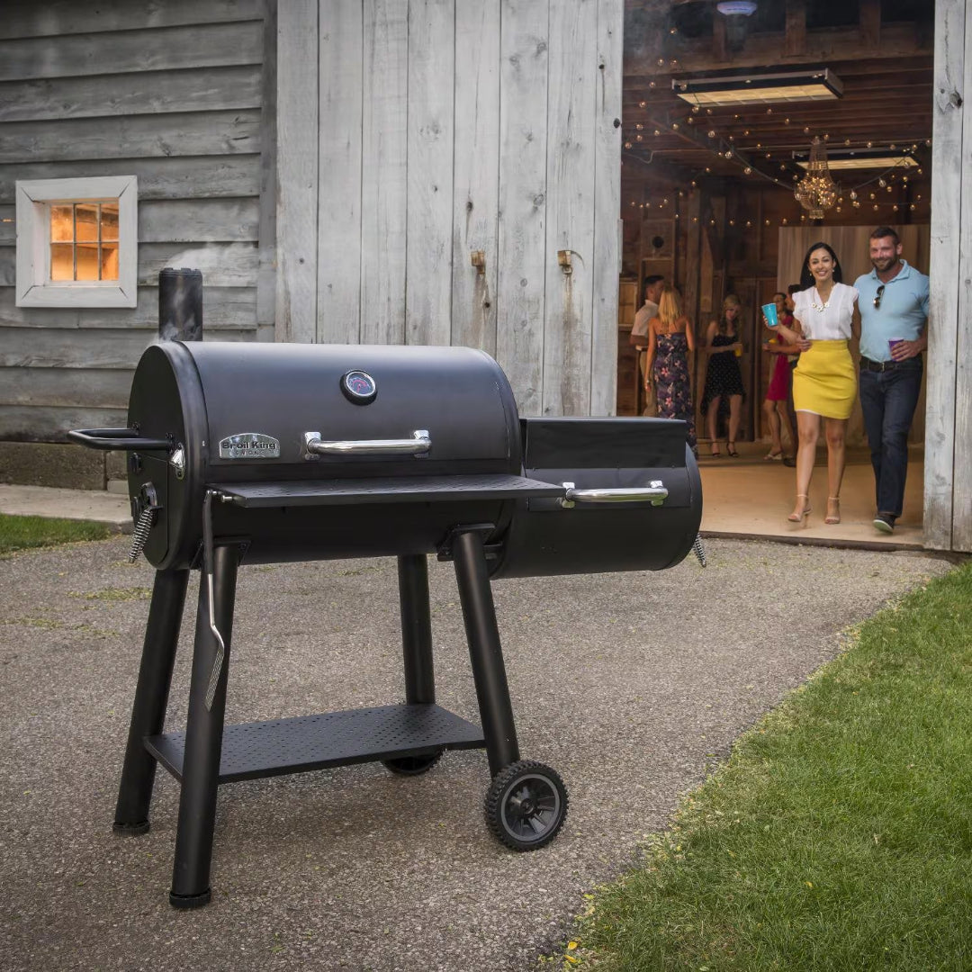 Grill, Broil King, offset smoker, steel barrel-style design with chimney, front shelf, bottom storage shelf, and wheels