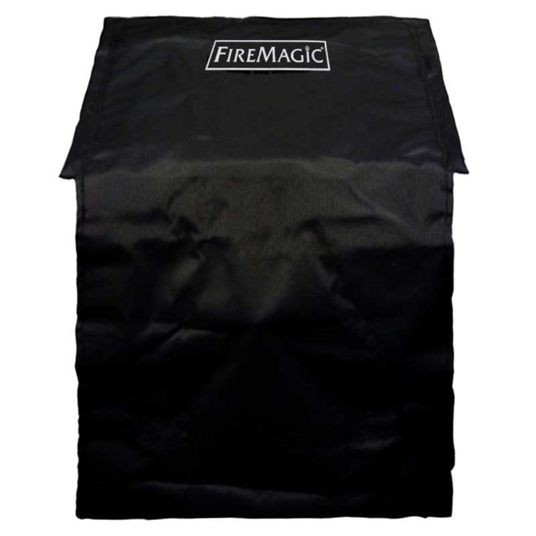 FireMagic black heavy-duty weather-resistant polyester grill cover with FireMagic logo for built-in and freestanding outdoor gas grills