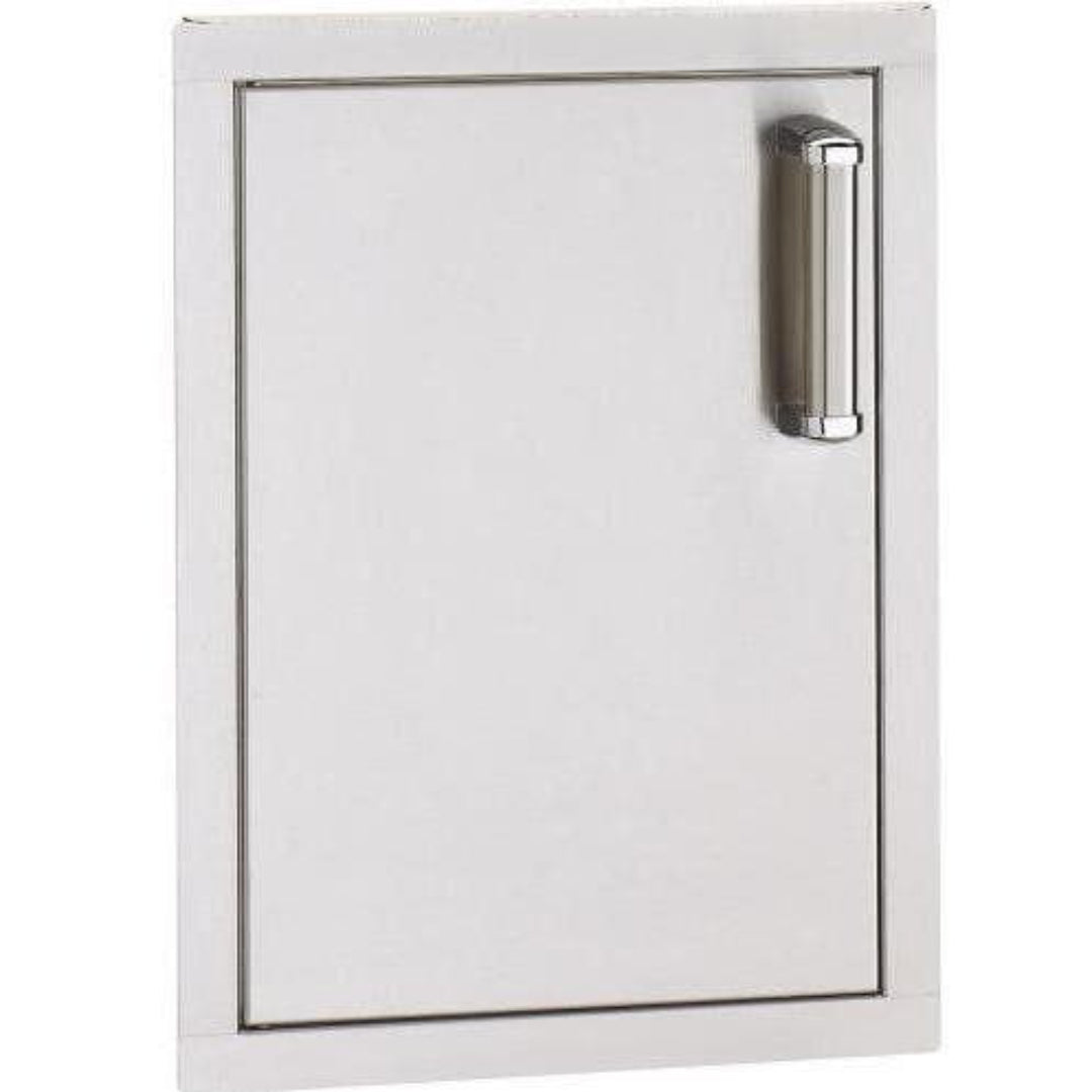 A built-in Fire Magic stainless steel single access door with a left-hinged design, featuring a sleek white handle.