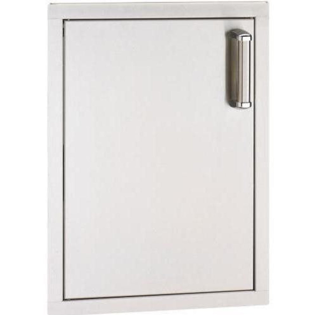 A built-in Fire Magic stainless steel single access door with a left-hinged vertical design and soft-close feature.