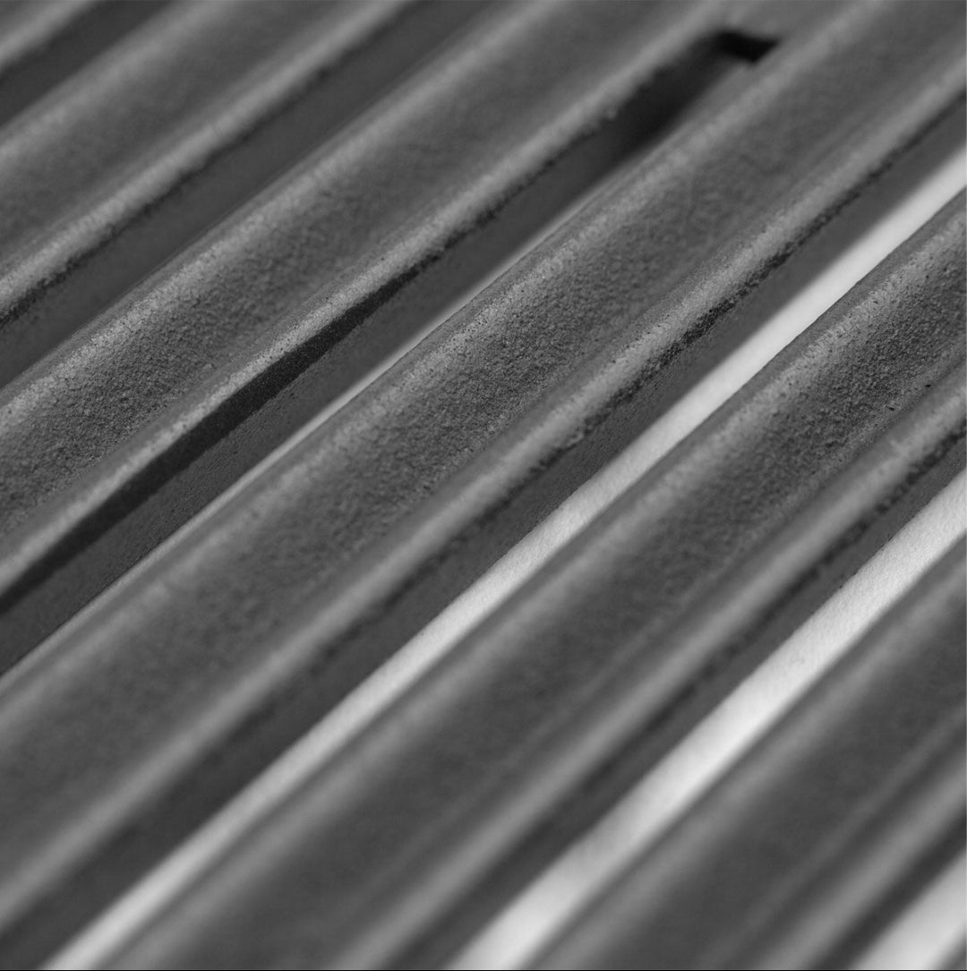 Cooking grates, Broil King, cast iron, close-up texture, angled top-down view