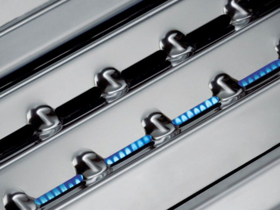 Flame tamers, Broil King, Baron series, stainless steel with blue flame, close-up heat distribution view