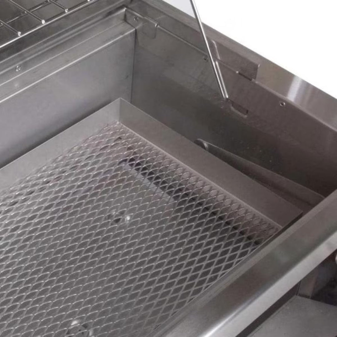 Expanded steel charcoal basket and ash pan inside offset smoker firebox — heavy-duty replacement charcoal tray for smokers and grills