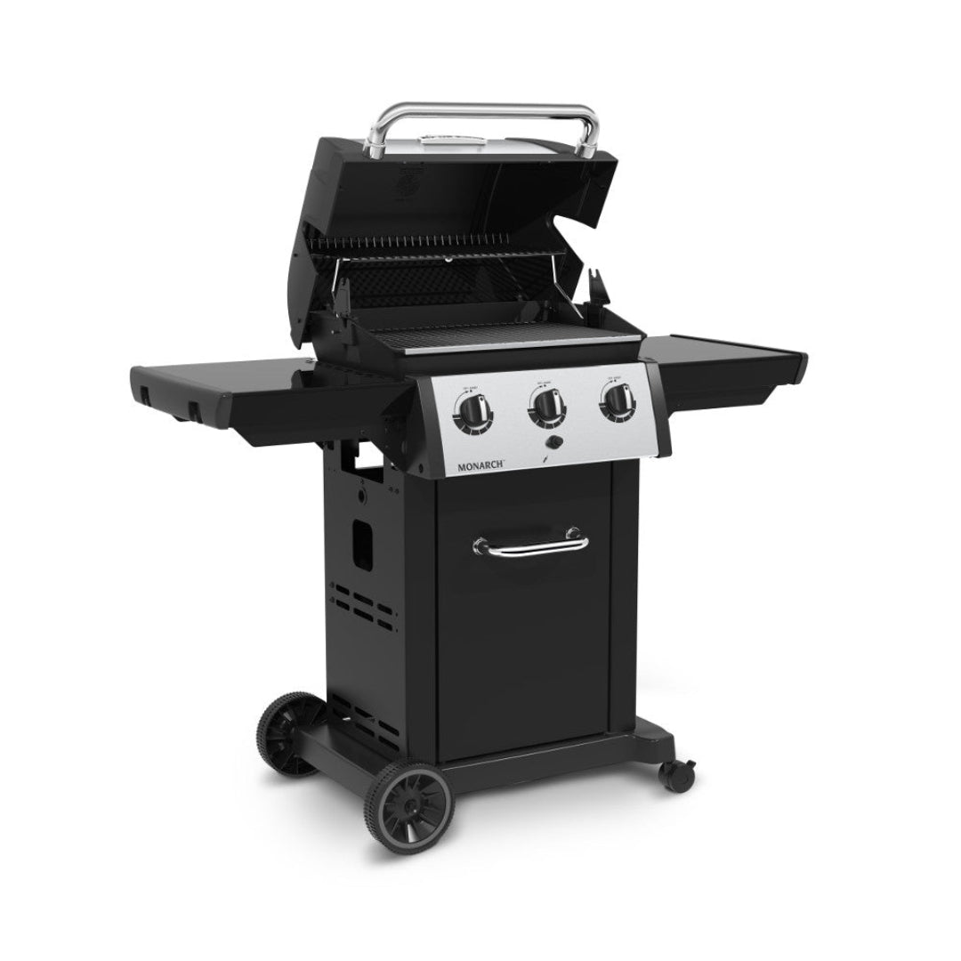 Freestanding grill, Broil King, Monarch series, 3-burner, lid open, side shelves extended, warming rack shown