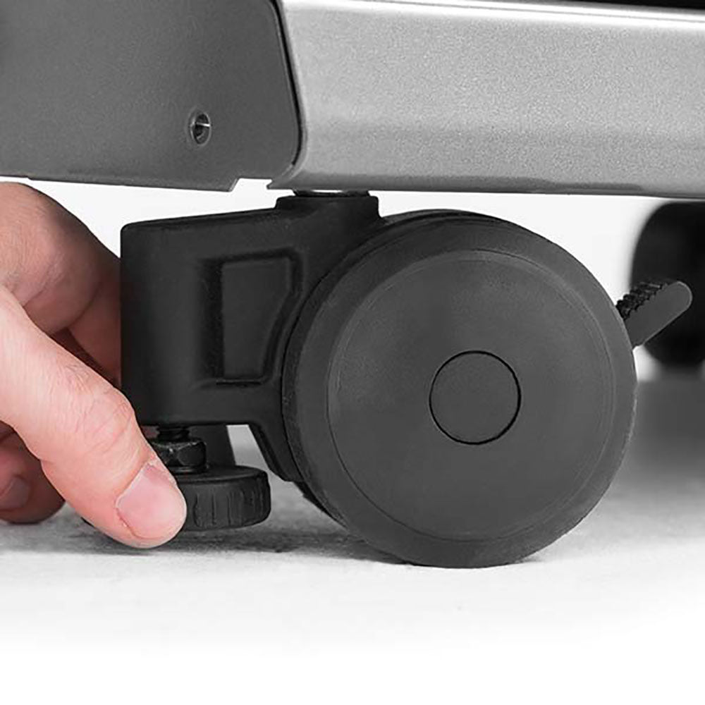 Caster wheel, Broil King, Baron Series, locking swivel caster being adjusted on grill base