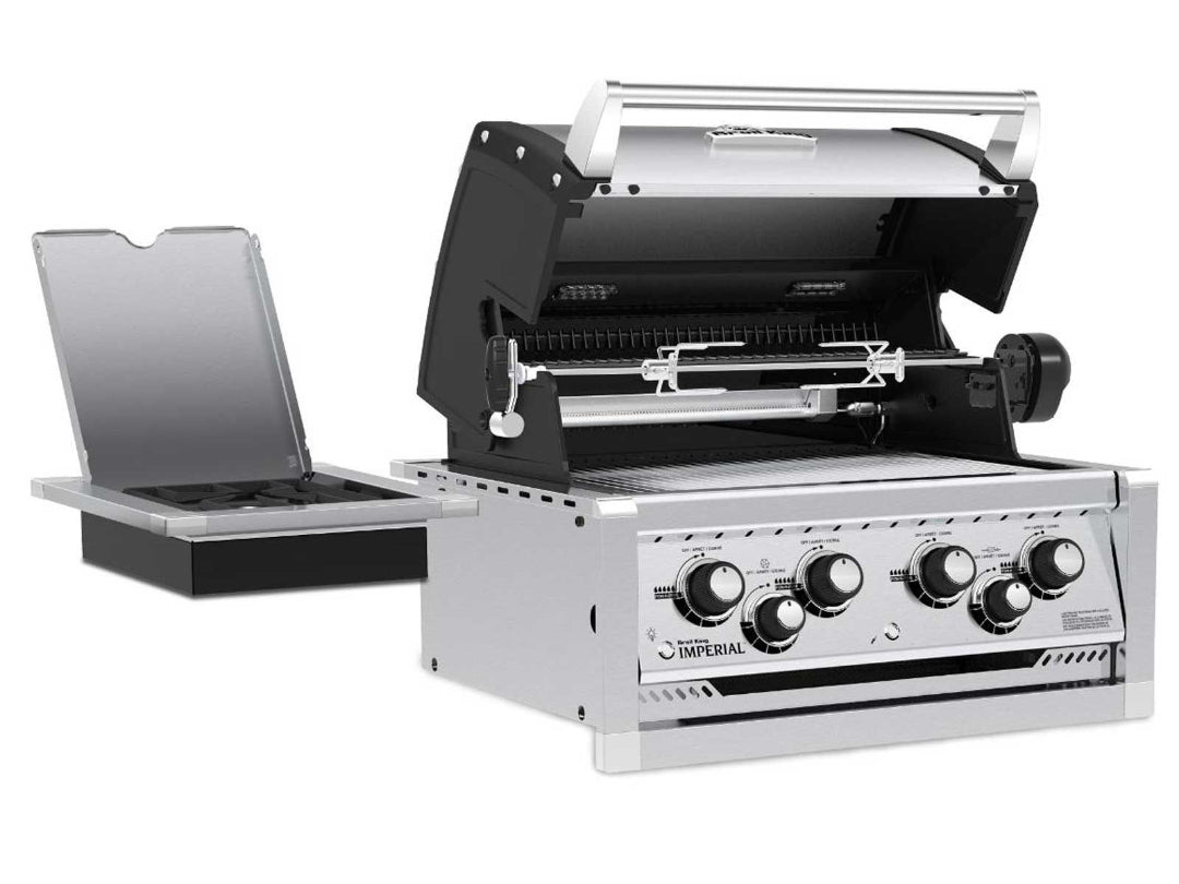 Broil King Imperial built-in grill with open hood, rotisserie, and side burner with lid open