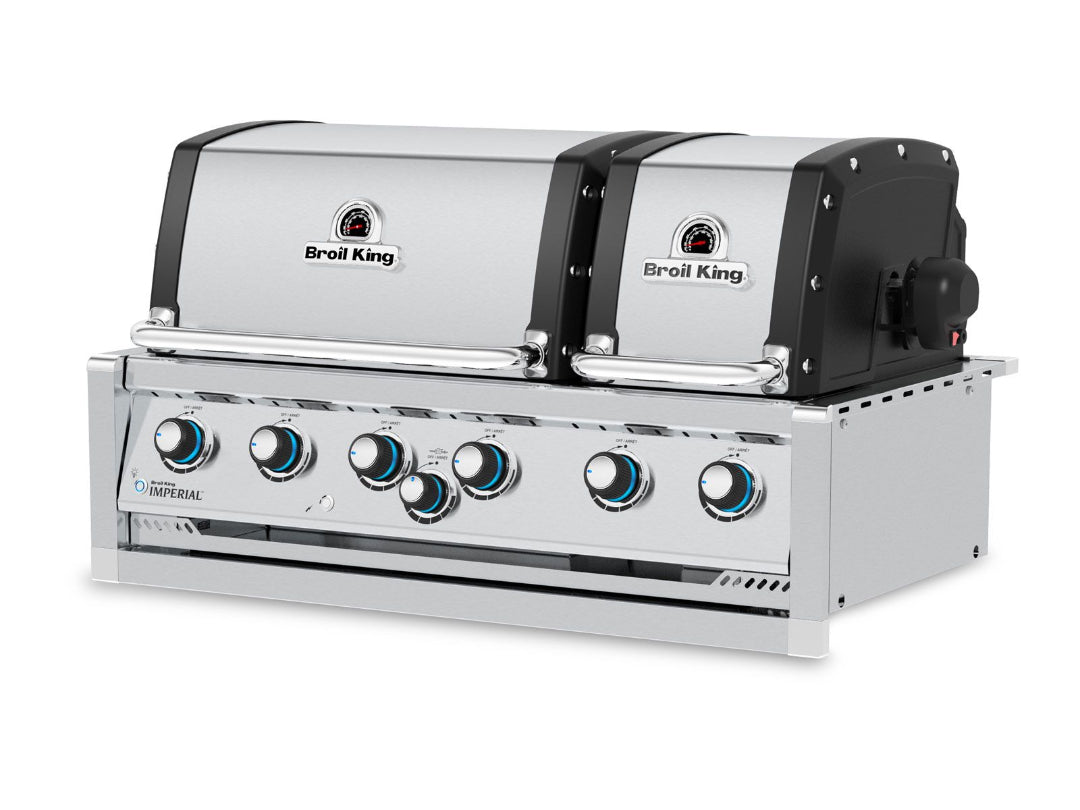 Broil King Imperial built-in gas grill with dual stainless steel hoods and blue LED control knobs.