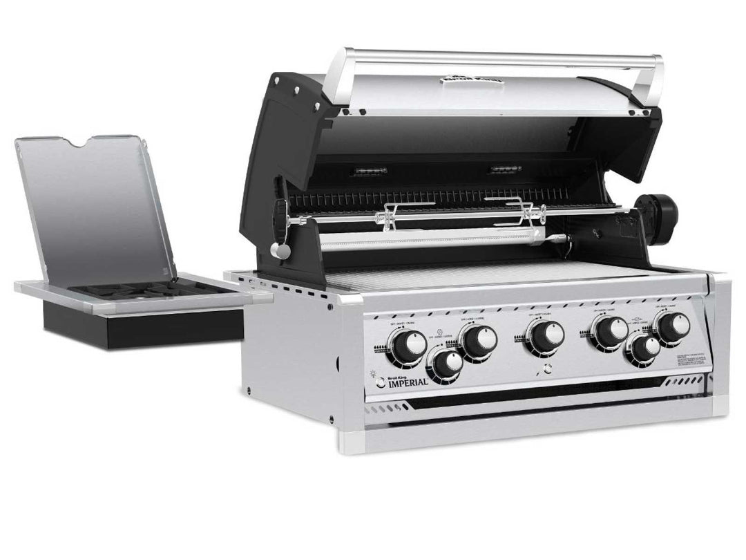 Built-in gas grill, Broil King, Imperial series, rotisserie burner with open hood and 5-burner stainless steel control panel.