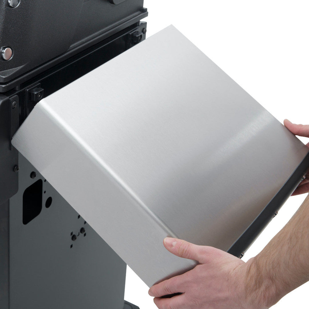 Grill base, Broil King, Baron Series, stainless steel cabinet panel being installed