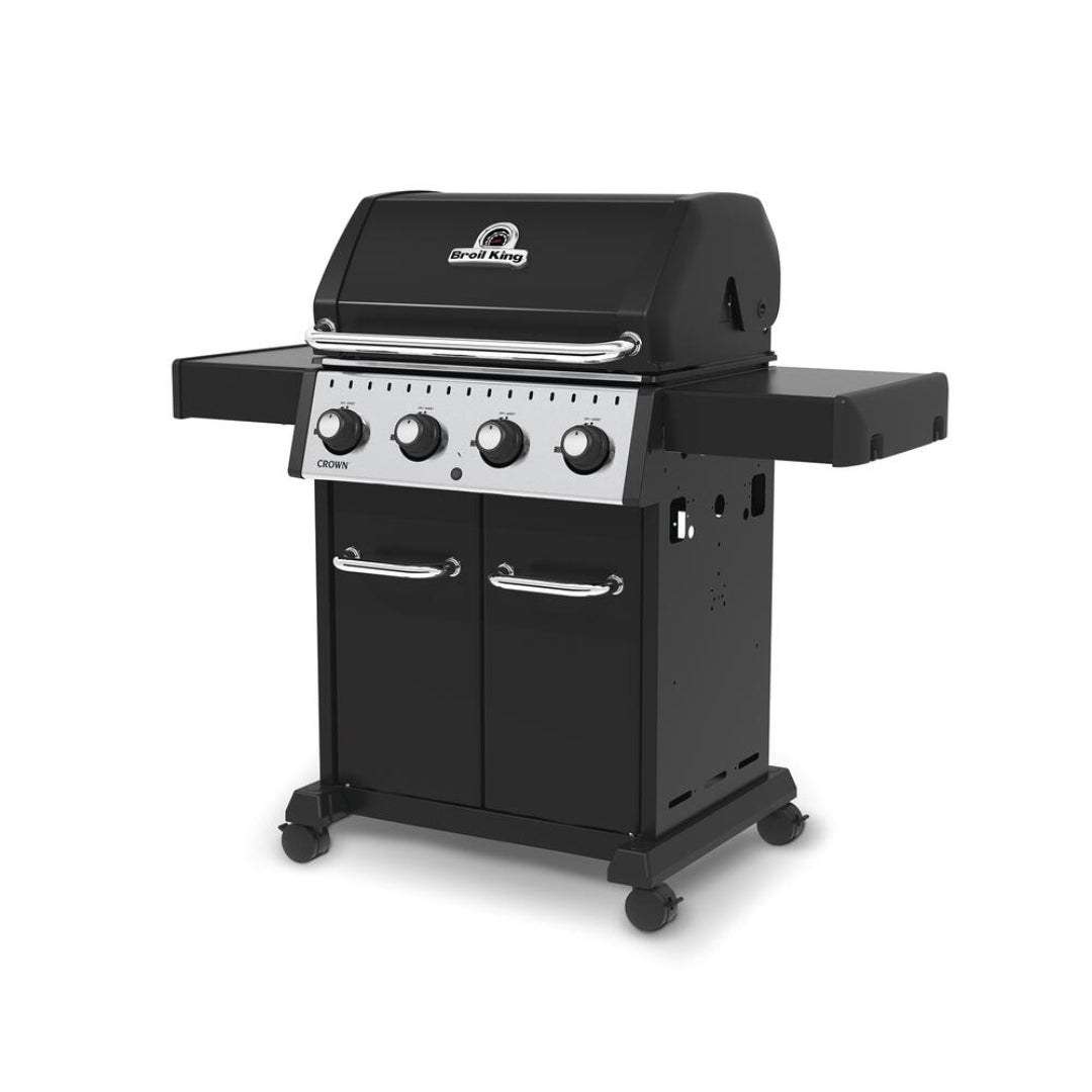 Freestanding grill, Broil King, Crown Series, 4-burner propane gas grill with black cabinet, chrome handles, and side shelves