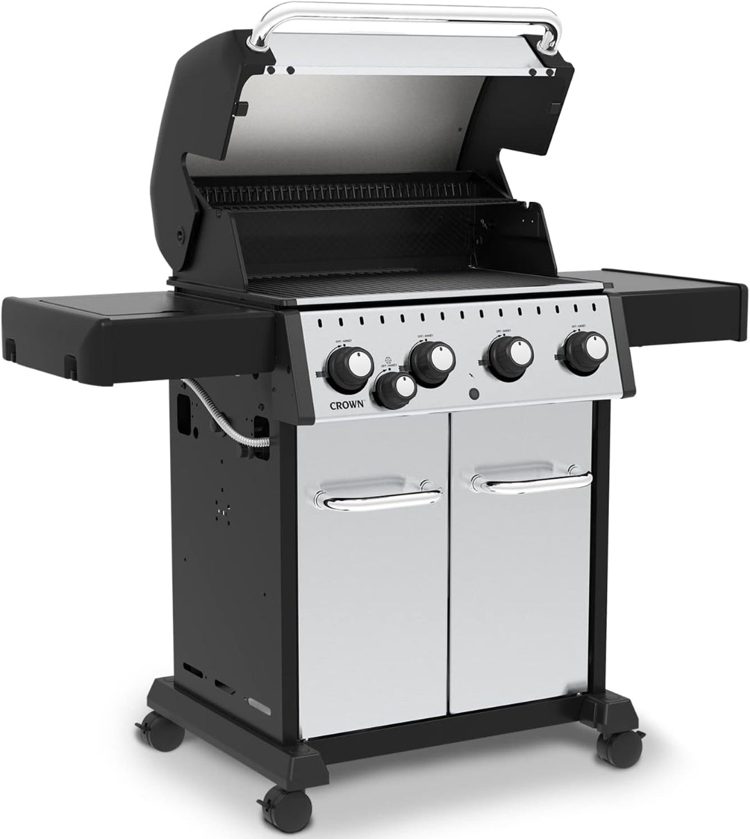 Freestanding grill, Broil King Crown Series, 4-burner propane model with hood open and side shelves extended