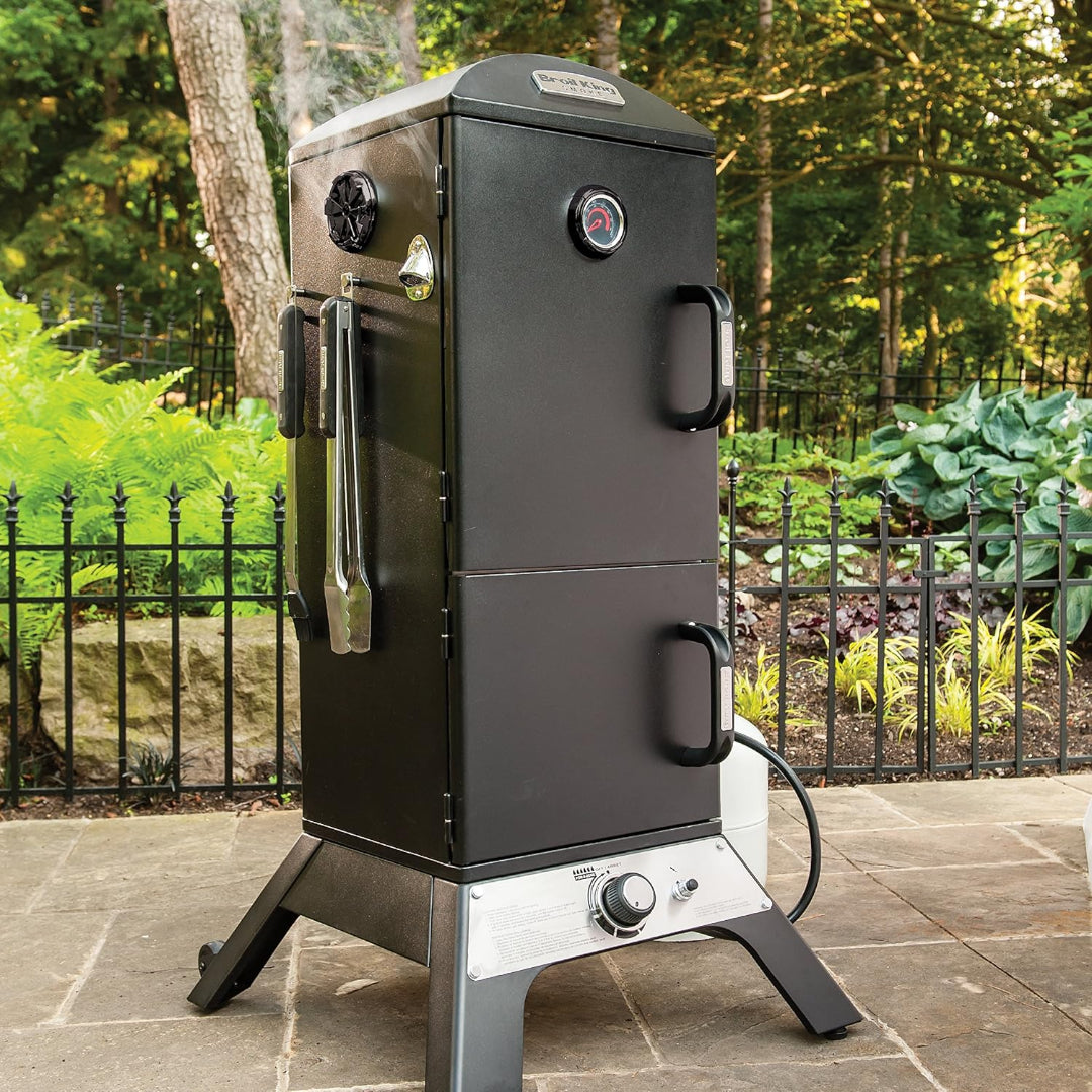 Vertical Gas Smoker, Broil King Smoke Series, Outdoor Patio Setting, Thermometer and Tool Hooks Visible
