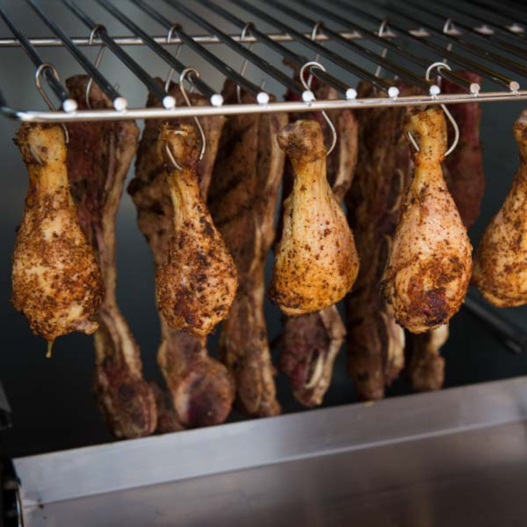 Vertical meat hooks, Broil King Smoke series vertical smoker, hanging chicken drumsticks and ribs for slow smoking