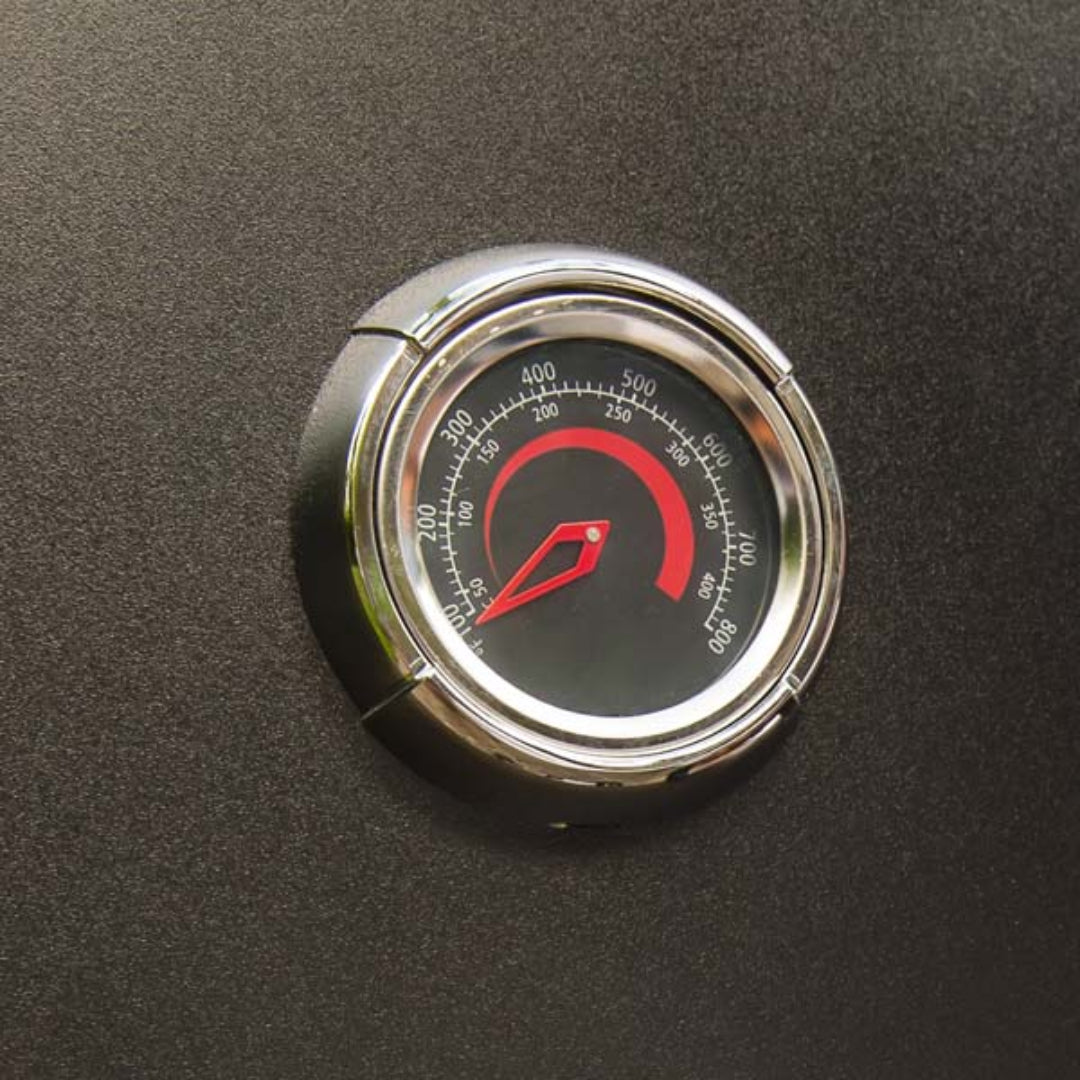 Grill thermometer, Broil King Smoke series, chrome bezel with red gauge displaying internal cooking temperature