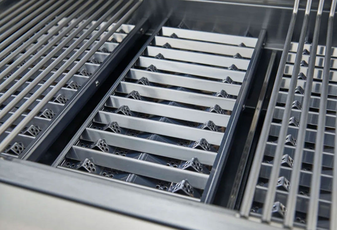 Broilmaster B-Series 32-inch BSB324P 4-burner stainless propane gas grill interior close-up with stainless steel cooking grates and V-shaped flavorizer bars vineandflame.com