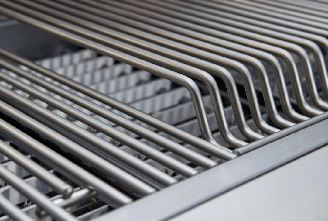Broilmaster B-Series BSB405N 40-inch 5-burner stainless natural gas grill close-up of heavy-duty stainless steel grill grates and elevated warming rack