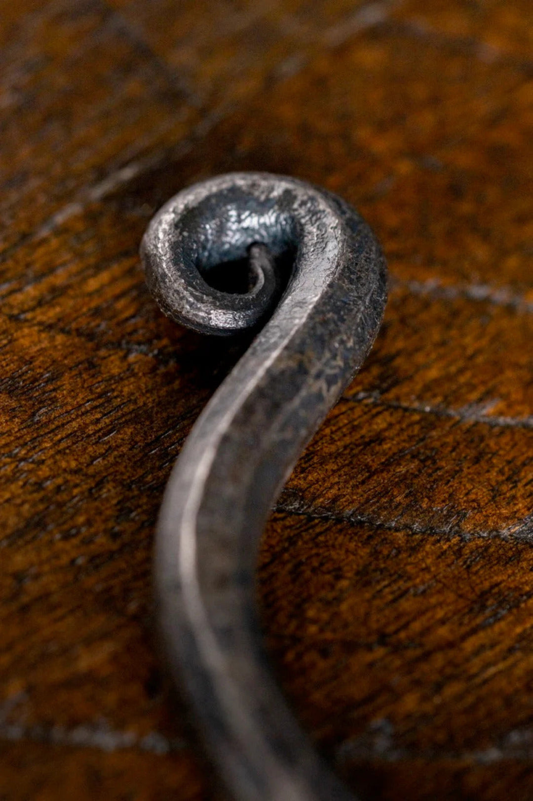 CC-90003 hand-forged wrought iron scroll hook close-up, rustic hammered metal wall hook