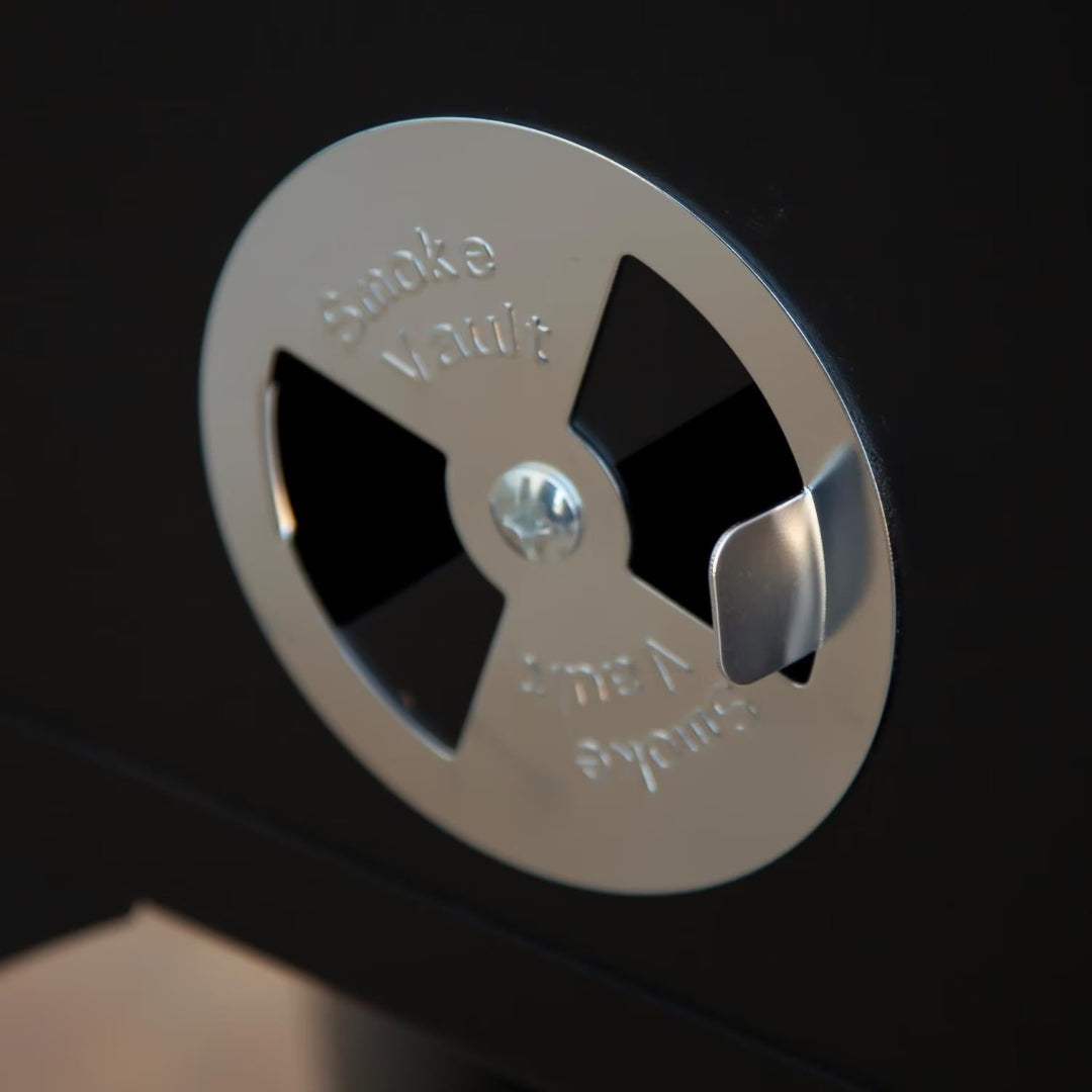 Camp Chef Smoke Vault 24-inch smoker stainless steel adjustable air intake vent damper close-up on black door