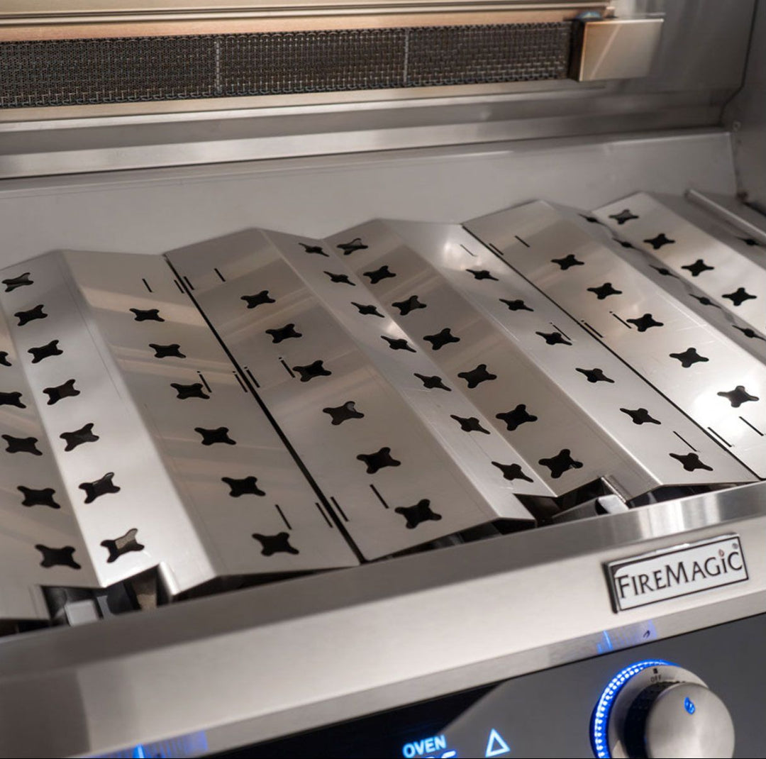 FireMagic E790i stainless steel replacement flavorizer bars (heat tents) with star-shaped cutouts installed in built-in gas grill interior