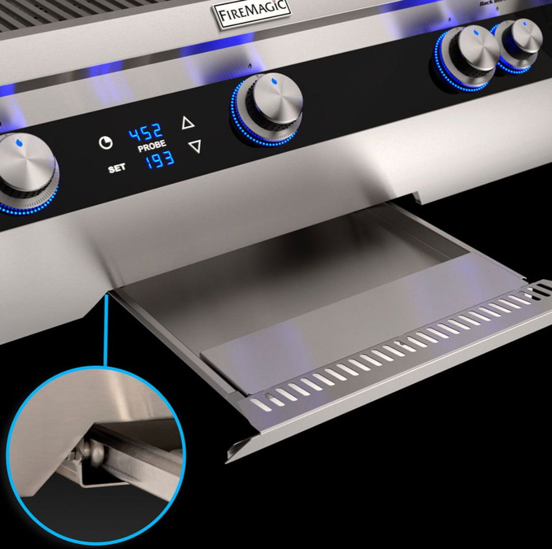 FireMagic E790i stainless steel built-in gas grill control panel with blue LED probe display, illuminated control knobs and pull-out removable stainless grease/drip tray