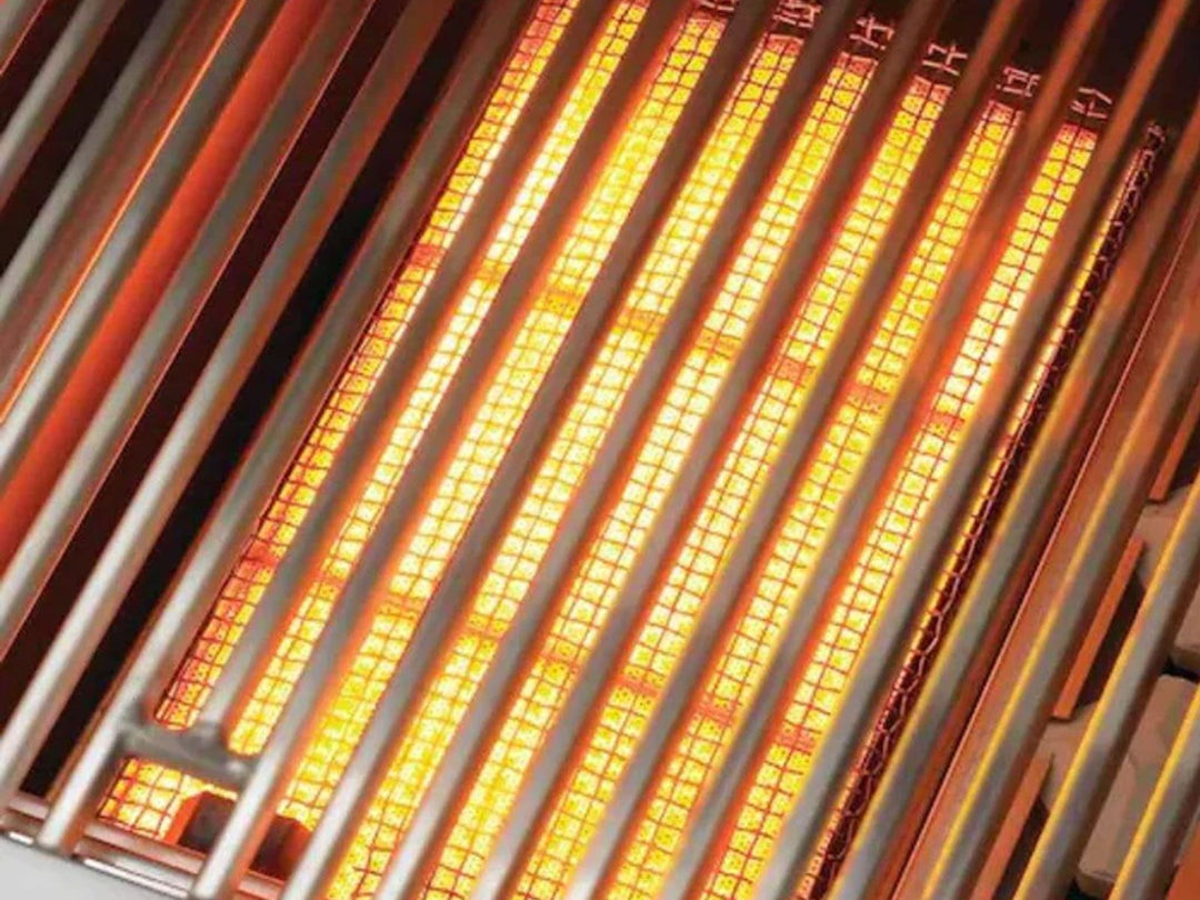 Close-up of glowing ceramic infrared sear burner E790i behind stainless steel cooking grates — Vine & Flame gas grill infrared searing replacement part