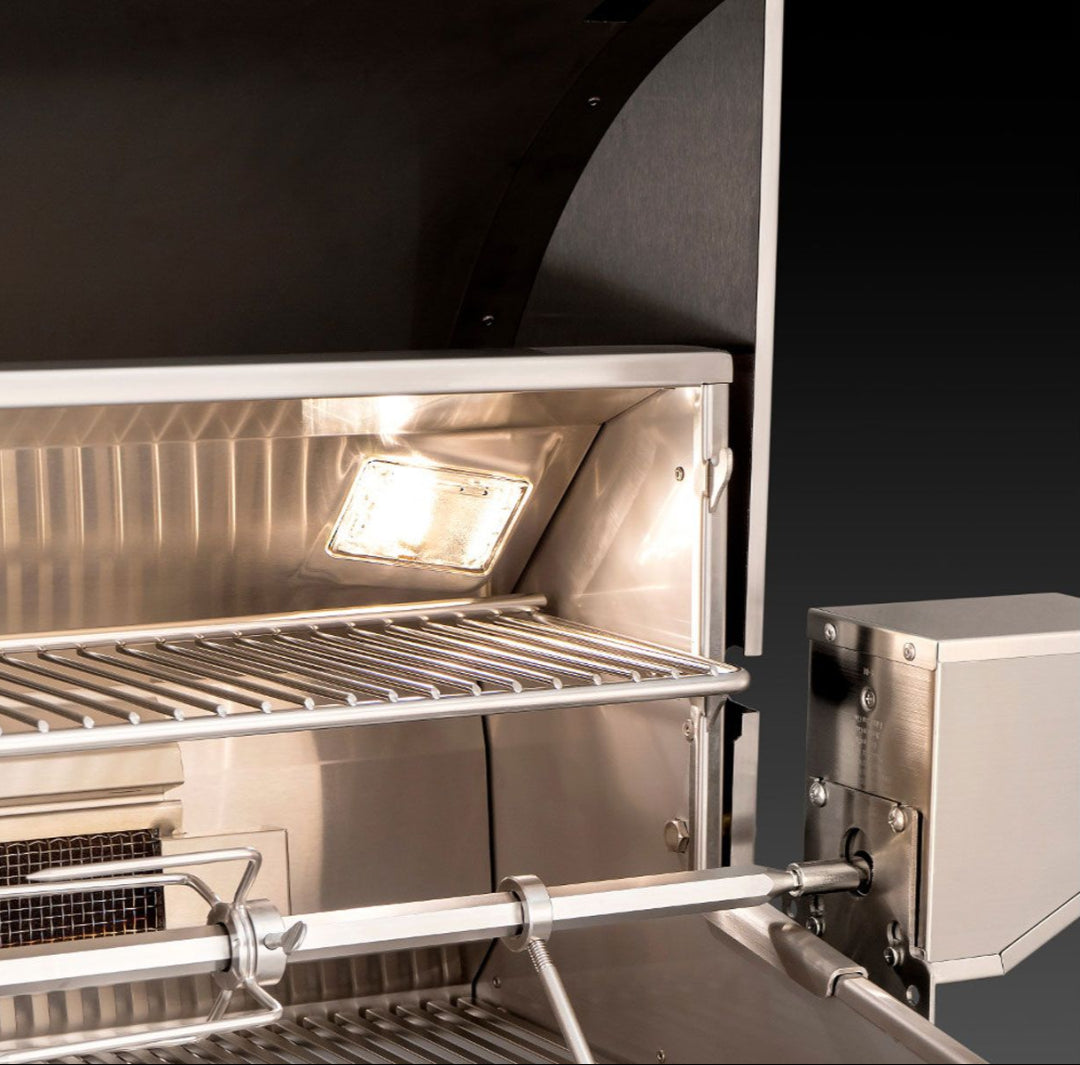 E790i stainless steel gas grill interior with rotisserie spit and motor housing, adjustable warming rack, stainless cooking grates and built-in interior light