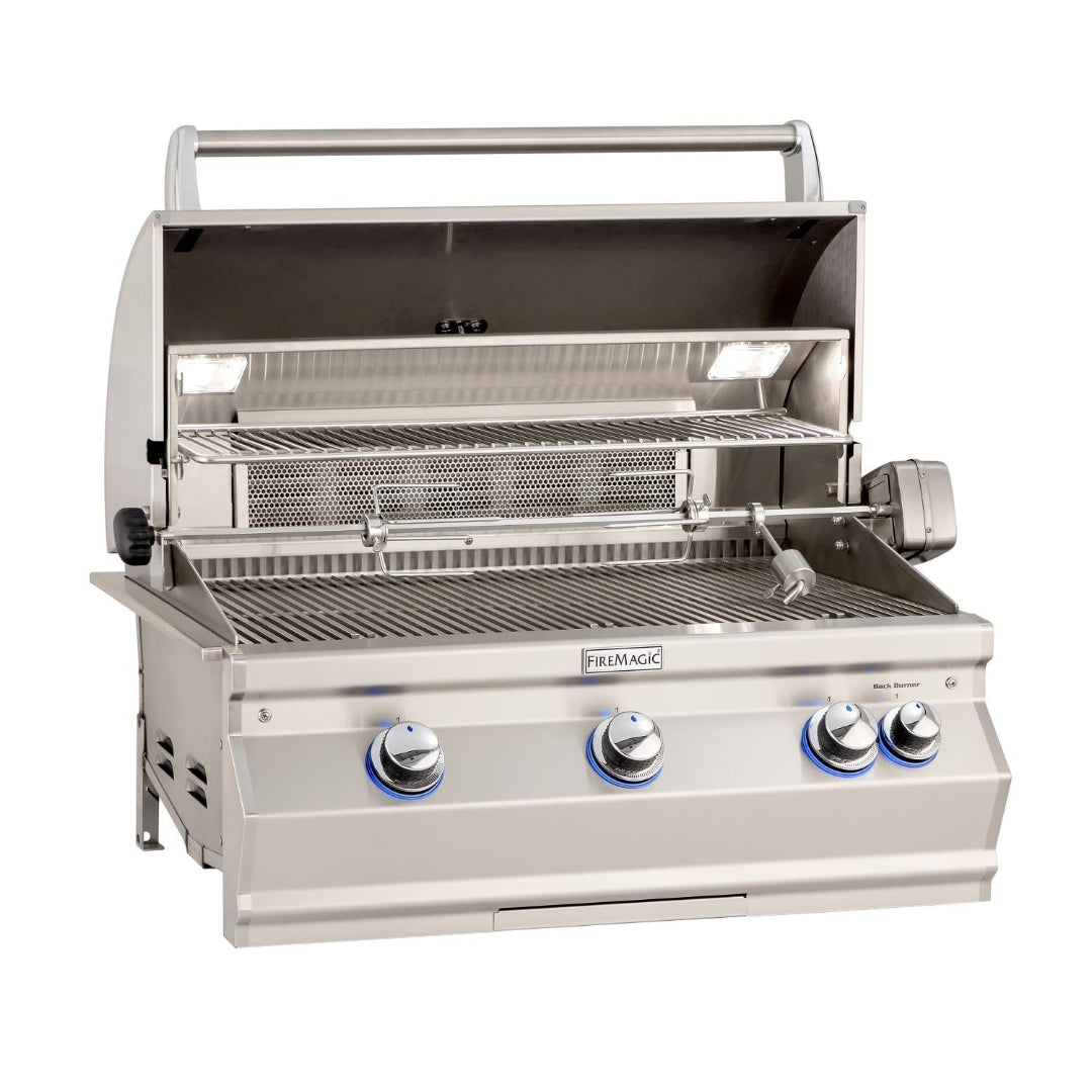 FireMagic FM-A540I stainless steel built-in outdoor gas grill head with three front burners, back burner, motorized rotisserie, warming rack and interior lights