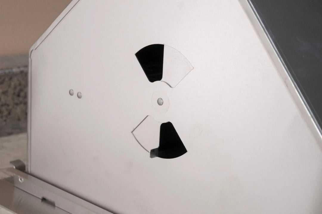 Fire Magic 30-inch charcoal grill hood vent adjustable stainless steel damper close-up replacement part for temperature control