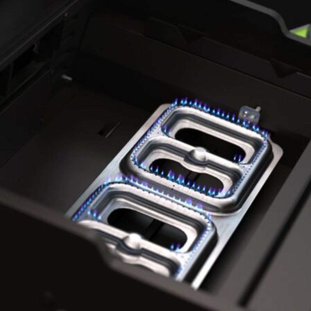 HALO Elite 1B Griddle HZ-1007-ANA close-up of dual-zone stainless burner with blue flames inside griddle housing