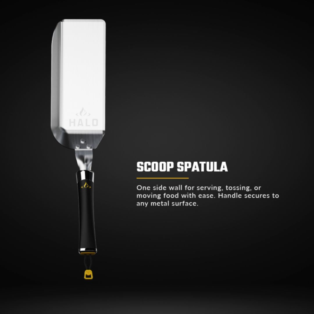 HALO griddle scoop spatula — stainless-steel blade with HALO logo and black magnetic handle with yellow hanging loop on dark background