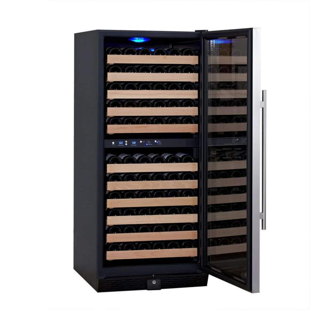 KBU100DX 100-bottle dual-zone wine cooler refrigerator, black cabinet with stainless steel handle, tempered glass door, wooden slide-out shelves, blue LED interior lighting and dual digital temperature displays