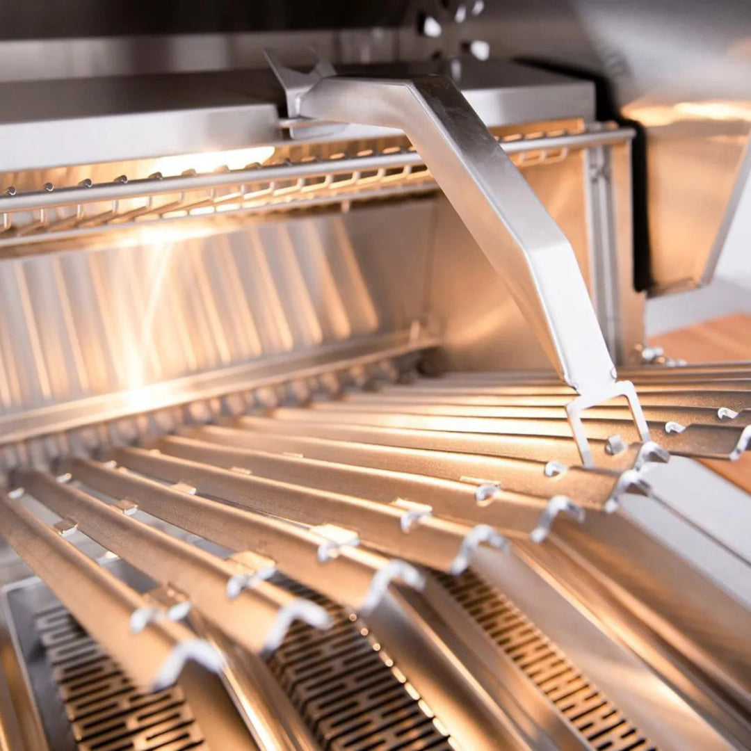 Interior, American Made Grills Muscle 54", V-shaped flame tamers and warming rack under internal lighting