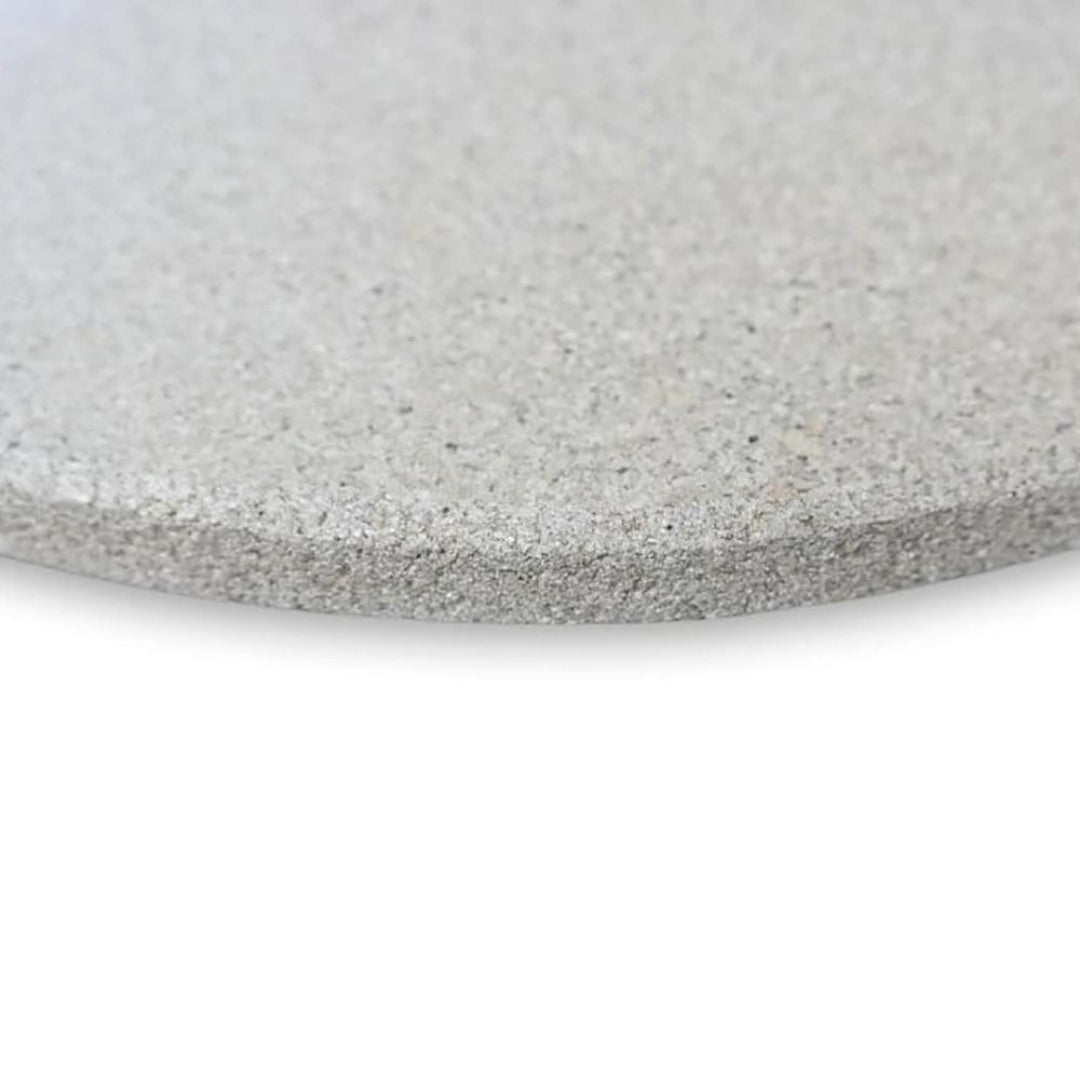 Close-up of Primo 16-inch round Fredstone baking stone, gray textured pizza baking stone for oven and kamado grill