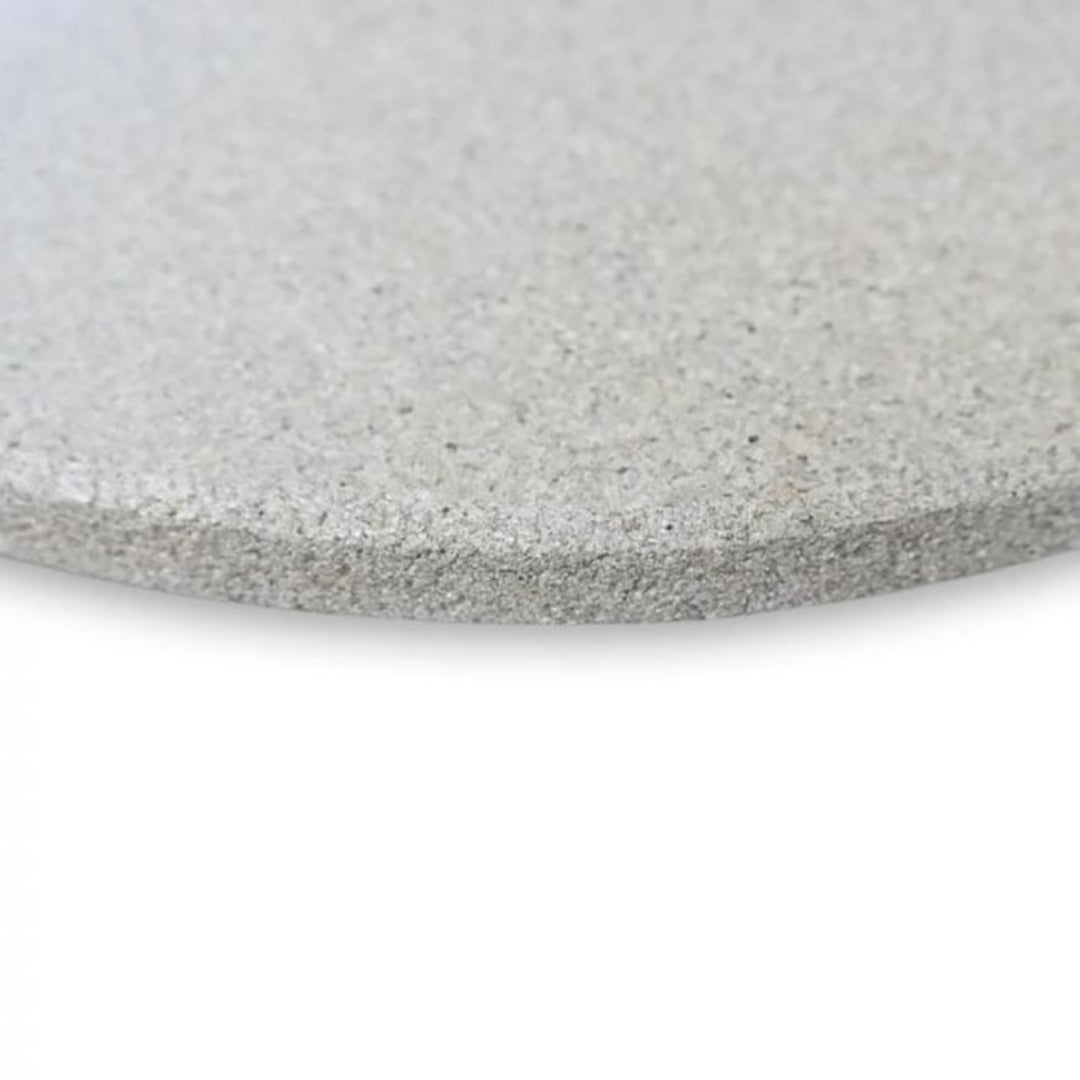 Primo 19-inch Round Fredstone baking stone pizza stone edge close-up, textured gray baking surface