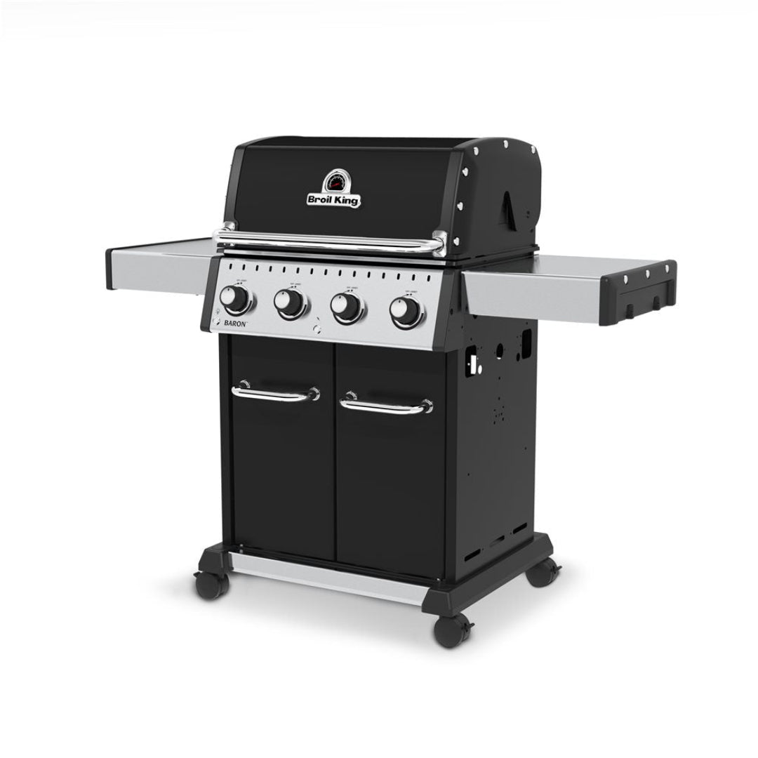 Freestanding gas grill, Broil King, Baron Series, 4-burner with closed hood, side shelves, and cabinet base on casters