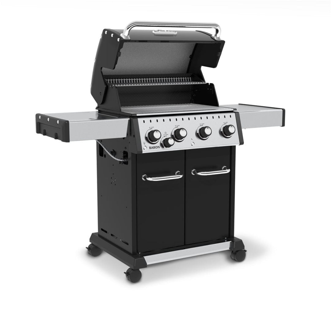 Freestanding grill, Broil King, Baron Series, 4-burner propane grill with open lid and stainless steel side shelves