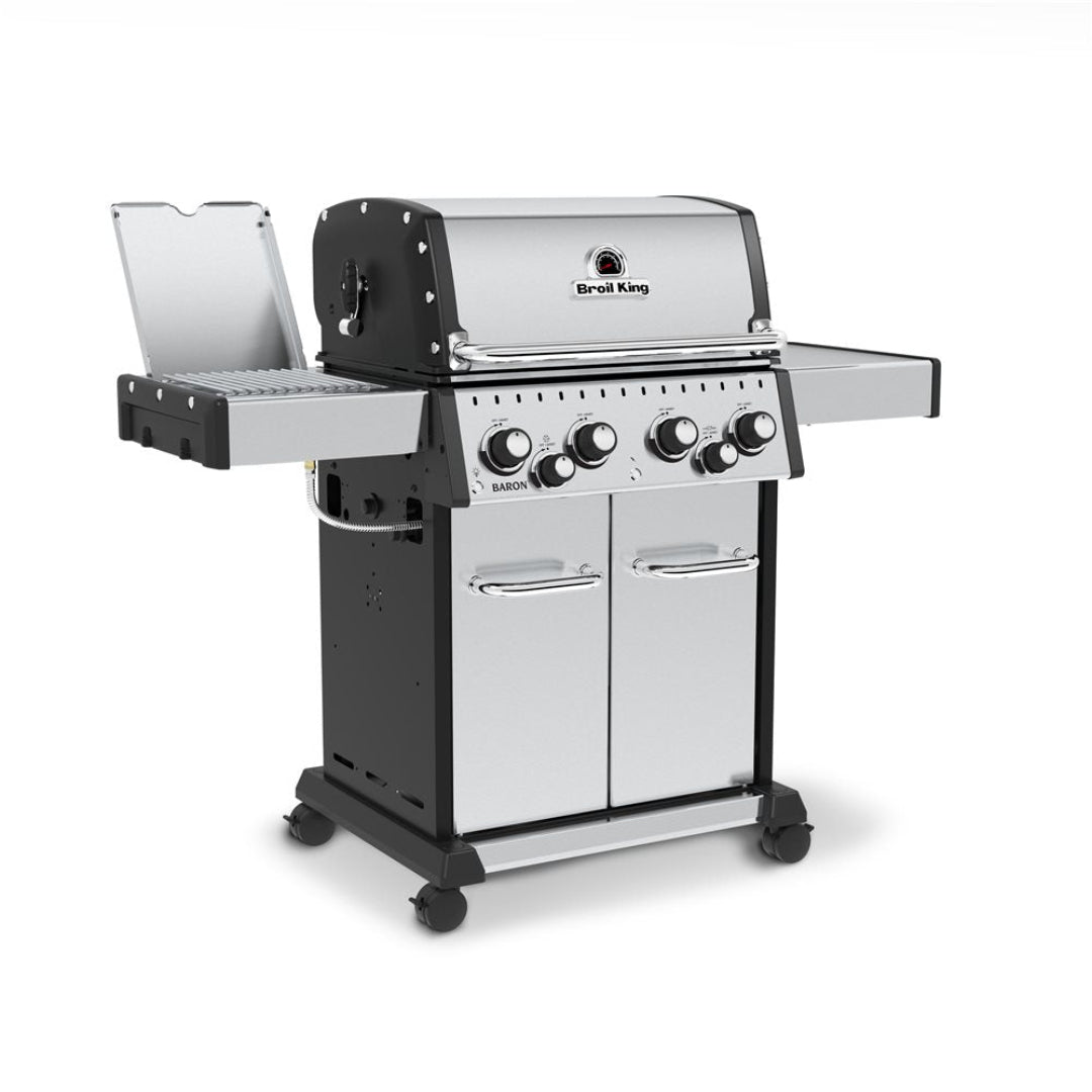 Freestanding grill, Broil King, Baron Series, stainless steel 5-burner with side burner open, angled view