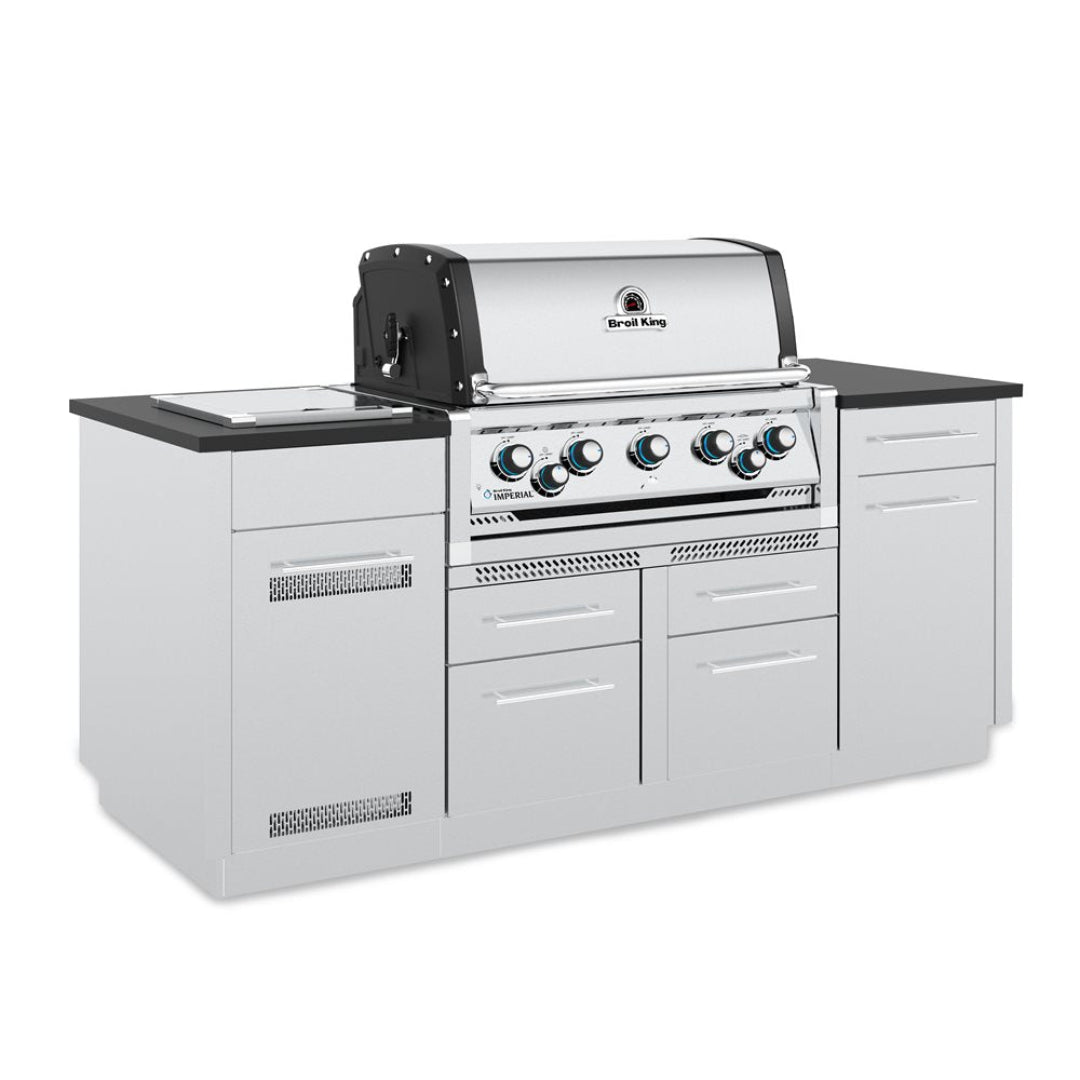 Broil King Imperial S 590i built-in 6-burner stainless steel outdoor kitchen island with black countertops, integrated storage drawers and side burner