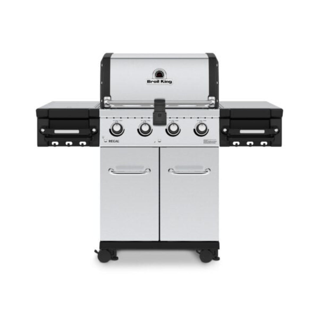Broil King Regal S 420 Pro stainless steel gas grill front view with double-door storage cabinet, fold-down side shelves with tool hooks, control knobs and caster wheels