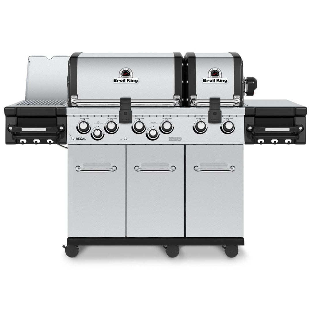Broil King Regal S 690 Pro IR 6-burner stainless steel gas grill front view with side shelves, side burners, rear infrared rotisserie and storage cabinet