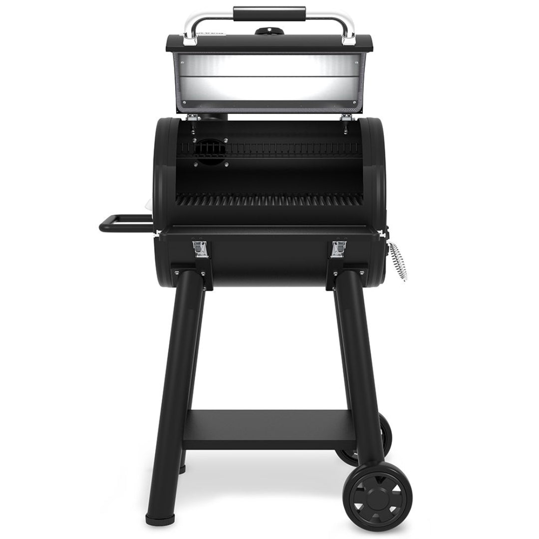 Charcoal grill, Broil King, Smoke Series, lid open showing cooking grates, freestanding with wheels and side shelf