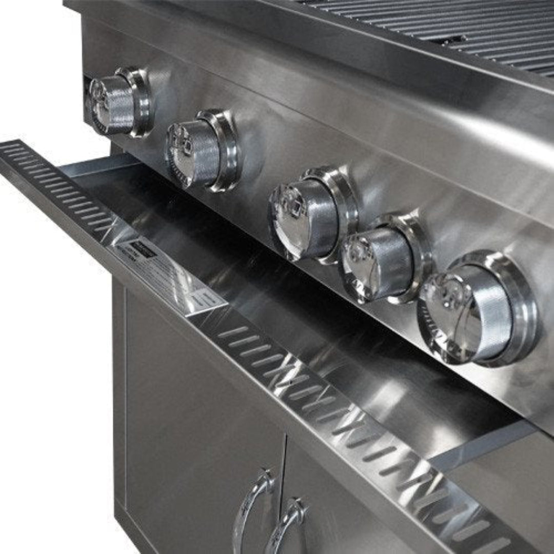 Built-in grill drawer, Broilmaster, stainless steel drip tray extended, close-up of control knobs and cabinet base