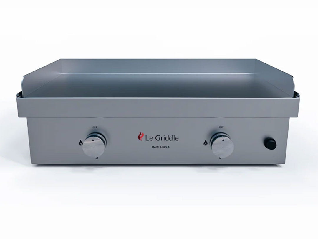 A silver Le Griddle 'The Ranch Hand' 30-Inch Built-In / Countertop Gas Griddle - GFE75 with two control knobs on the front panel.