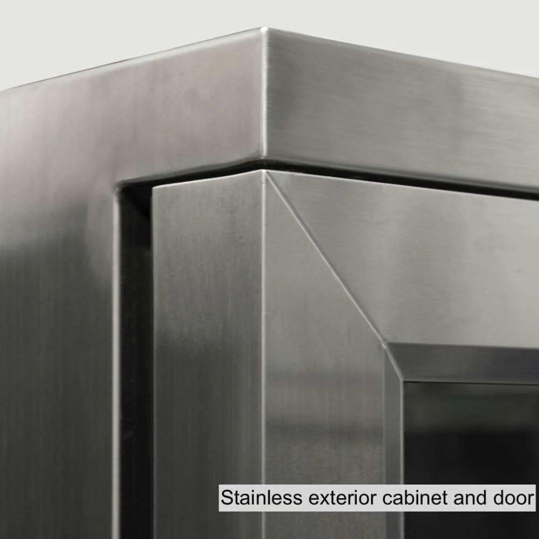 Kings Bottle stainless steel beverage cooler door corner close-up, brushed stainless exterior cabinet and mitered door frame for under‑counter wine and beverage refrigerator