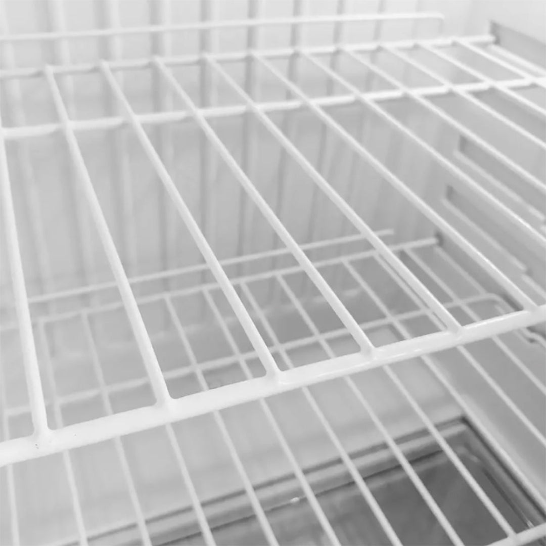 Close-up of white vinyl-coated wire replacement shelf inside beverage refrigerator wine cooler