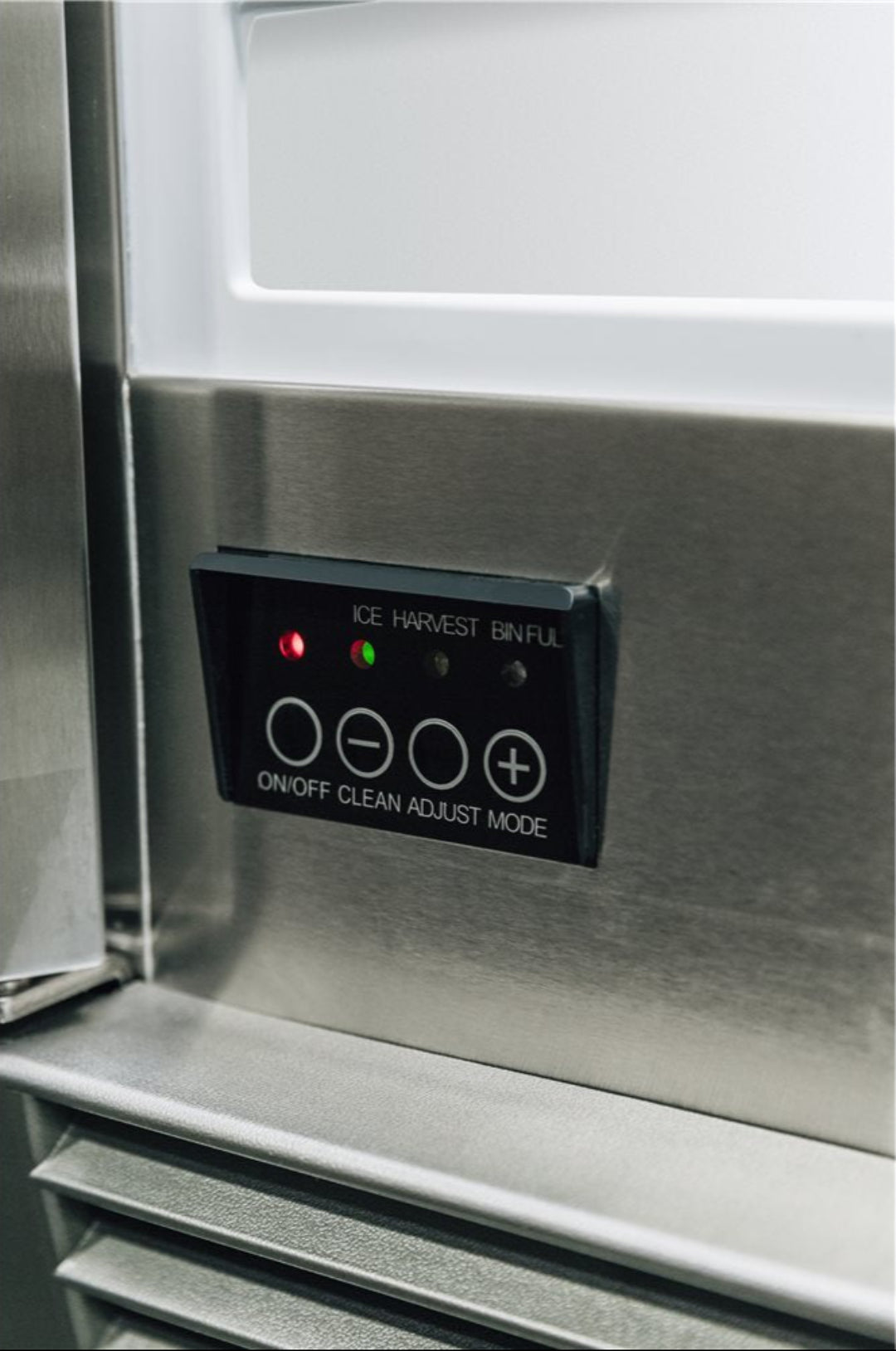 Trueflame TF-IM-15 stainless steel ice maker control panel close-up with ice harvest/bin full indicator lights