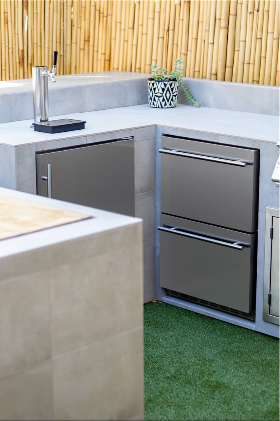 24-inch built-in stainless steel dual-drawer outdoor refrigerator undercounter beverage drawers for patio bar with kegerator tap in tiled outdoor kitchen (model 125-TF-RFR-24DK1)