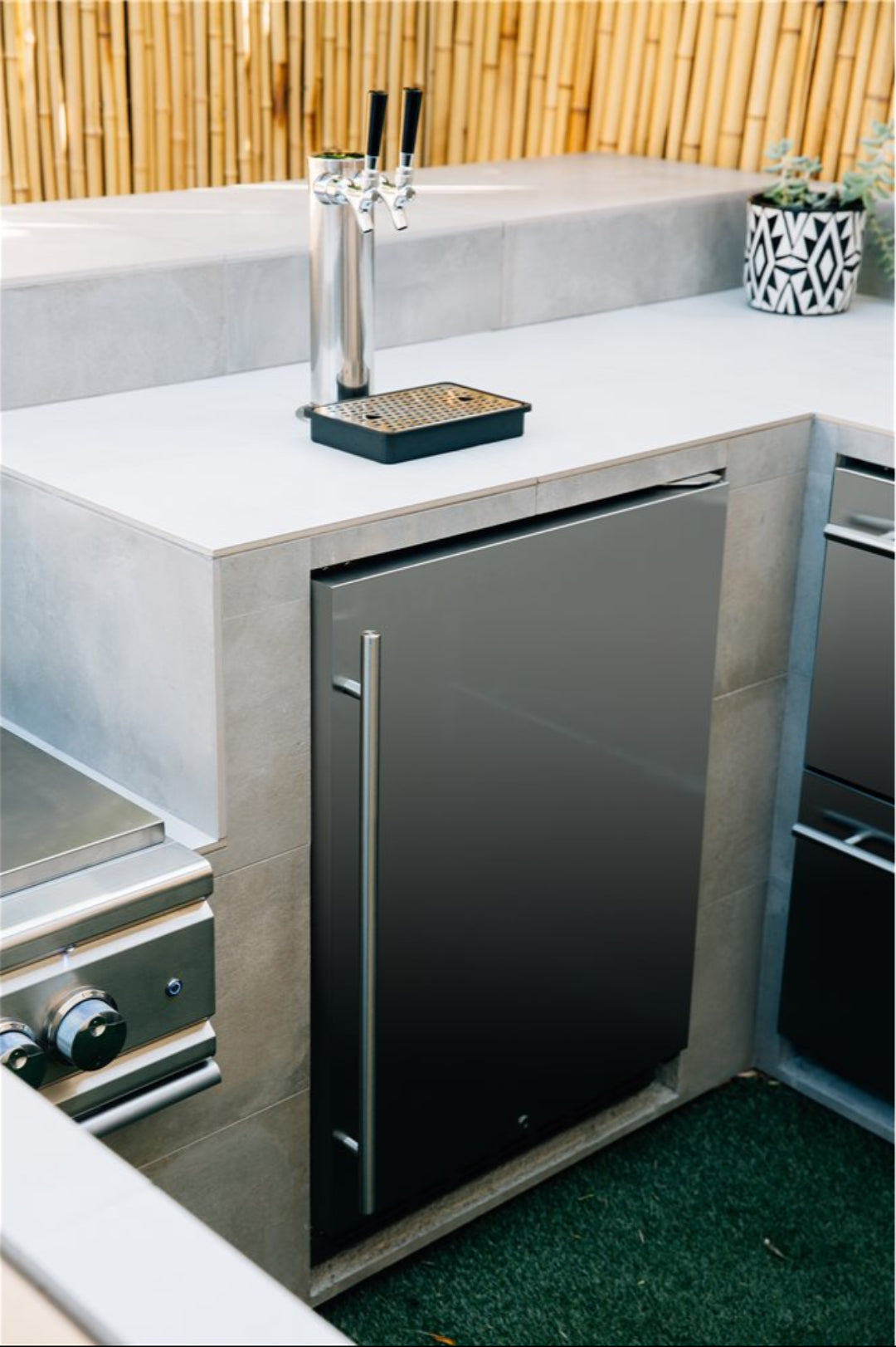 24-inch built-in undercounter outdoor dual-tap kegerator beer fridge with black stainless door for patio kitchen