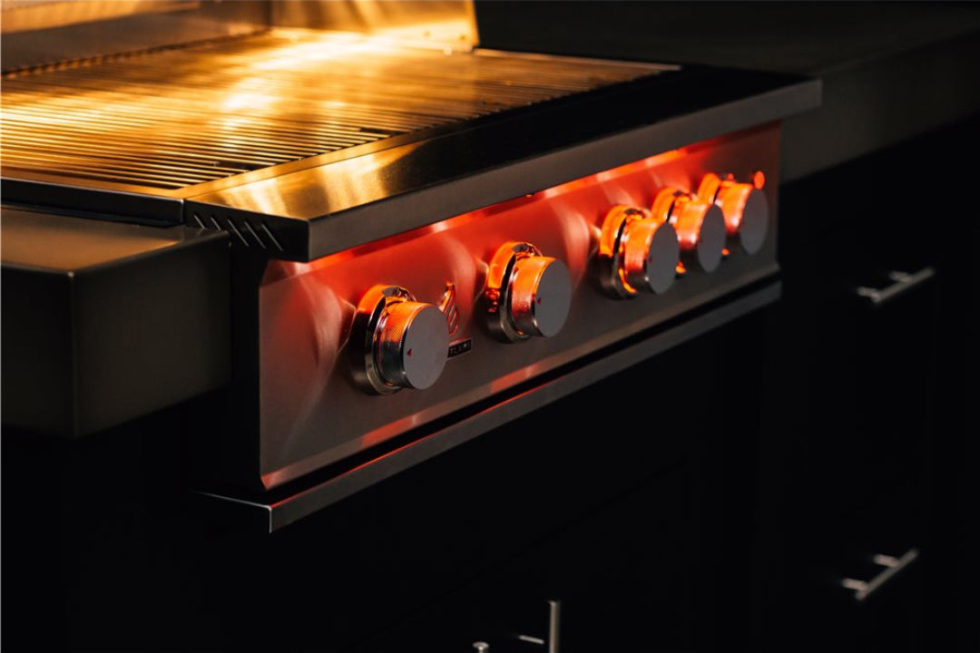 TrueFlame grill front panel stainless steel with red backlit illuminated control knobs close-up — built-in gas grill replacement panel for outdoor kitchen