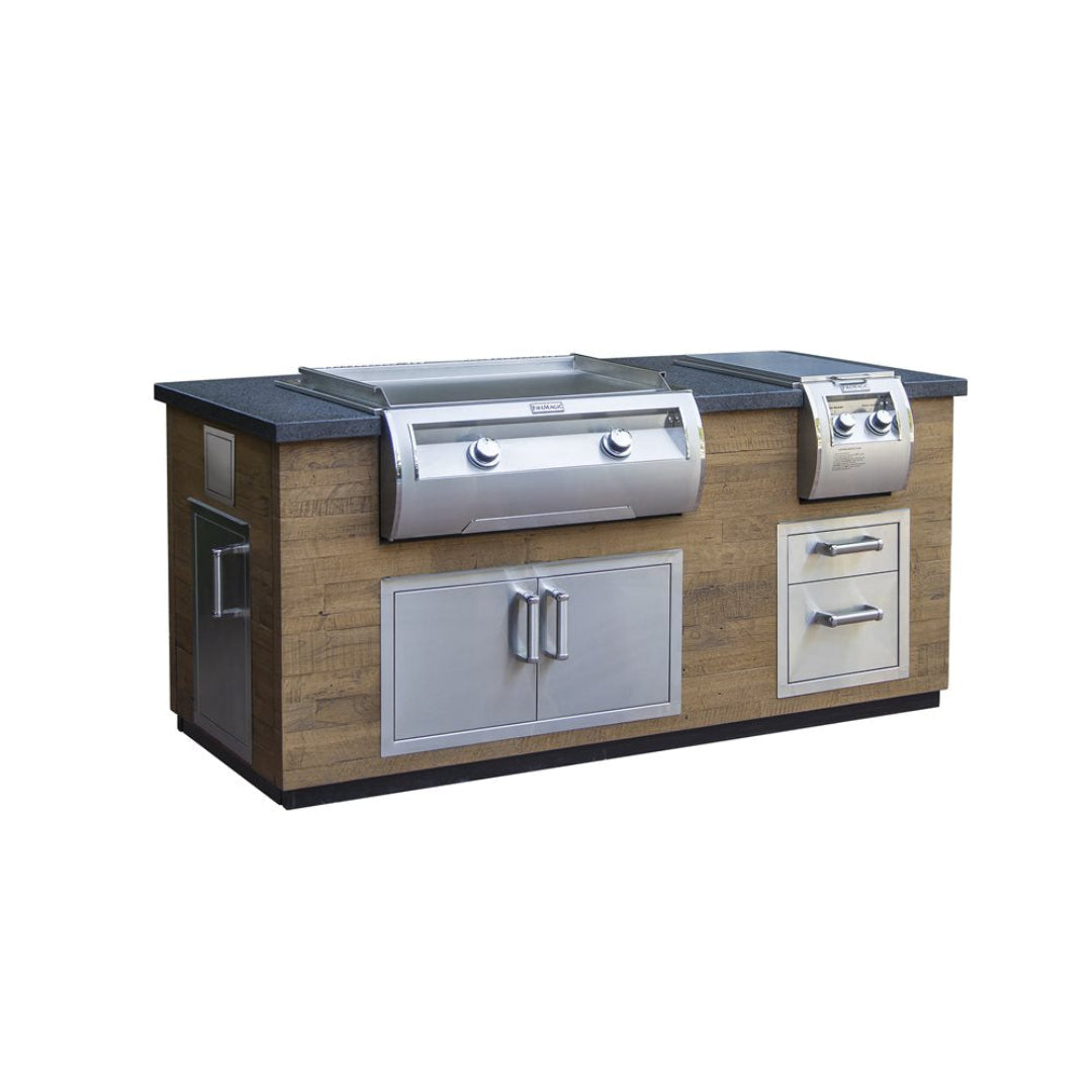 Built-in outdoor kitchen island with stainless steel gas grill and integrated side burner, weathered wood cabinet, black stone countertop, double-door storage and drawers for backyard patio